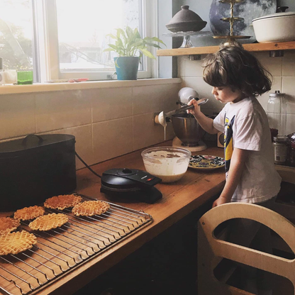 Ajustable Kitchen Helper Tower made from natural wood for children